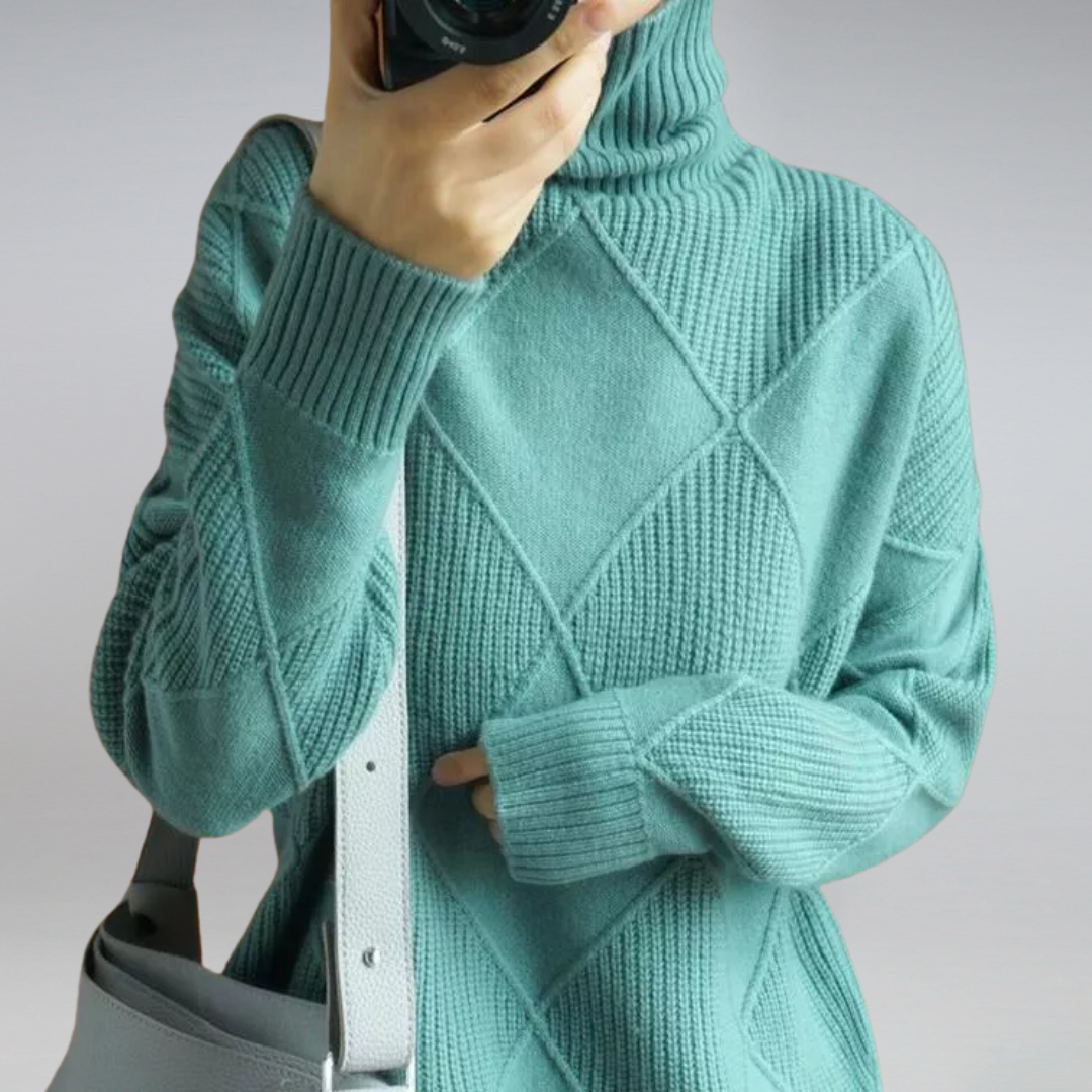 Women's elegant oversized turtleneck pullover. Versatile relaxed fit long sleeve sweater for winter fashion.