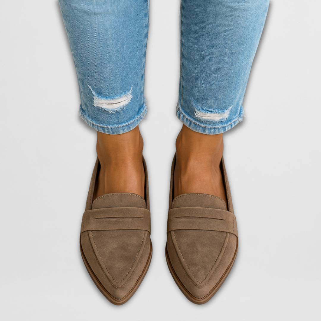 Elegant women's pointed-toe loafers. Perfect for formal or casual wear. Comfortable slip-on flats.