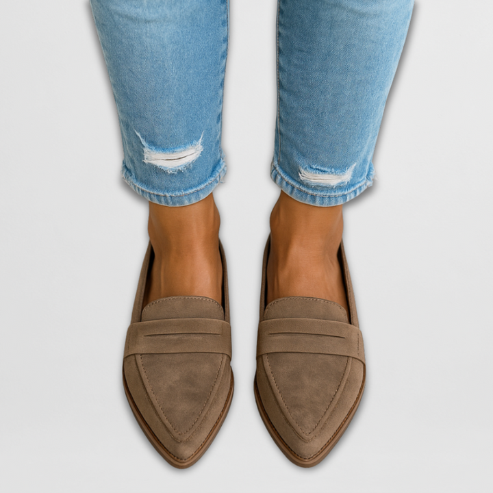 Elegant women's pointed-toe loafers. Perfect for formal or casual wear. Comfortable slip-on flats.