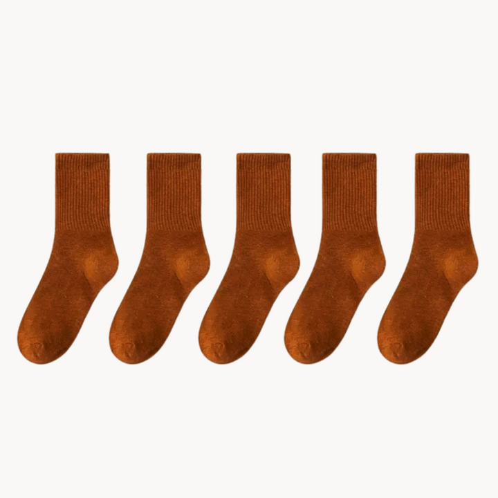 Advanced arch support in unisex socks, cushioned for active all-day comfort.