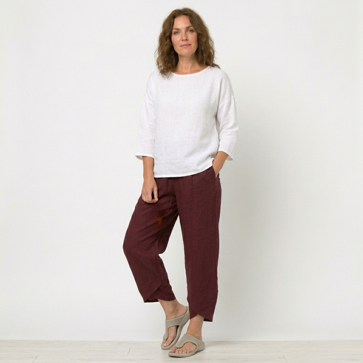 Elegant women's flowy trousers, high-waisted design with a chic tulip hem for versatile style.