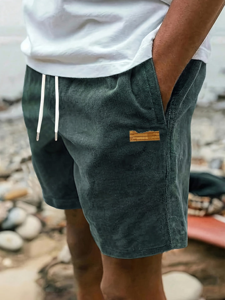 Stylish men's casual shorts, relaxed fit and drawstring for ultimate comfort and versatility.