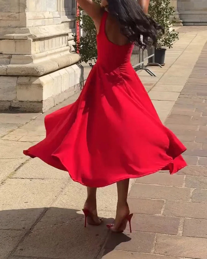Versatile red fitted midi dress for women, with delicate straps, ideal for summer events or evening wear.