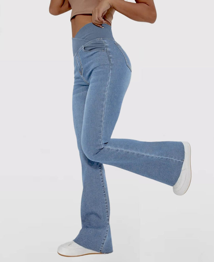 Dark blue slim fit high-waist stretch denim jeans for women, perfect for versatile wear.