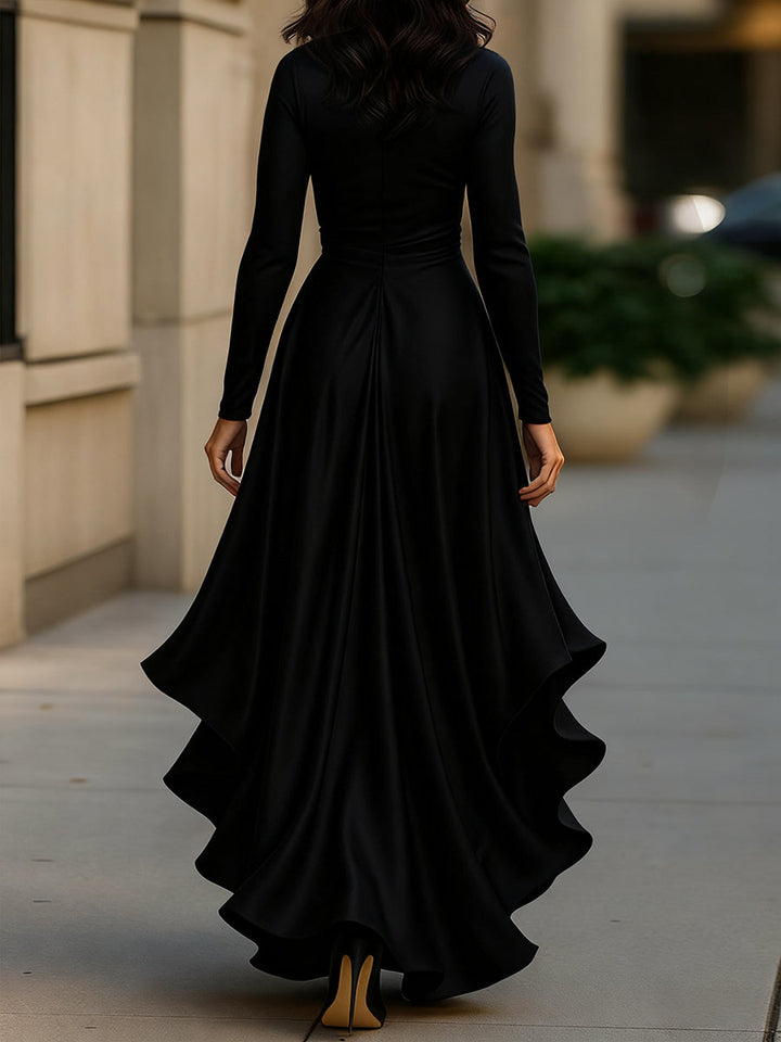 Elegant women's maxi dress with V-neck, pleats, and ruffles. A sophisticated choice for cocktail parties.