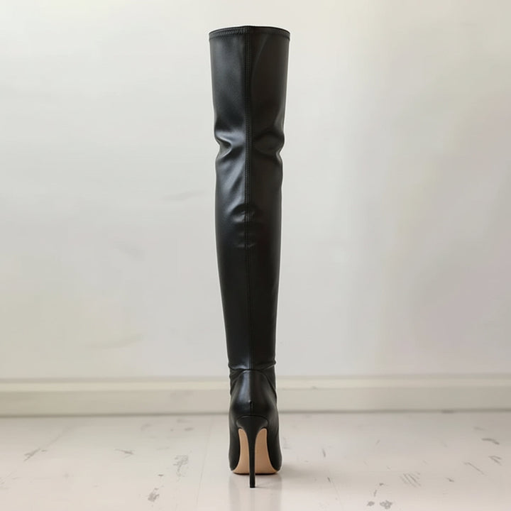 Chic black over-the-knee stiletto boots for women, featuring a sharp pointed toe for evening wear.