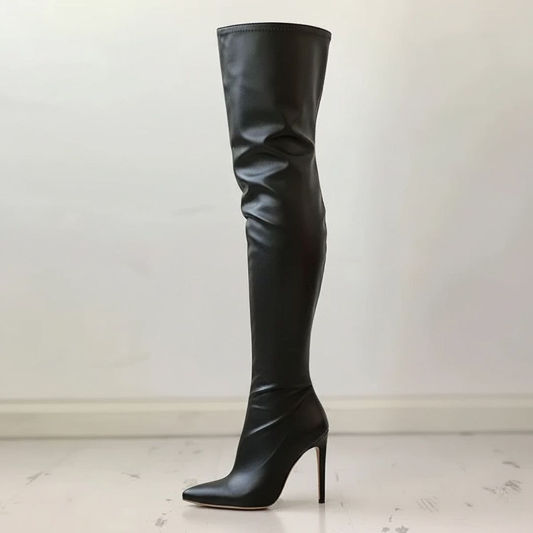 Women's elegant over-the-knee stiletto boots with a sleek pointed toe, perfect for fall & winter fashion.
