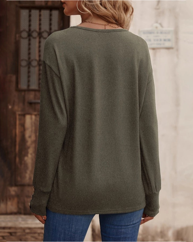 Modern women's solid V-neck long sleeve blouse, featuring front button details for everyday style.
