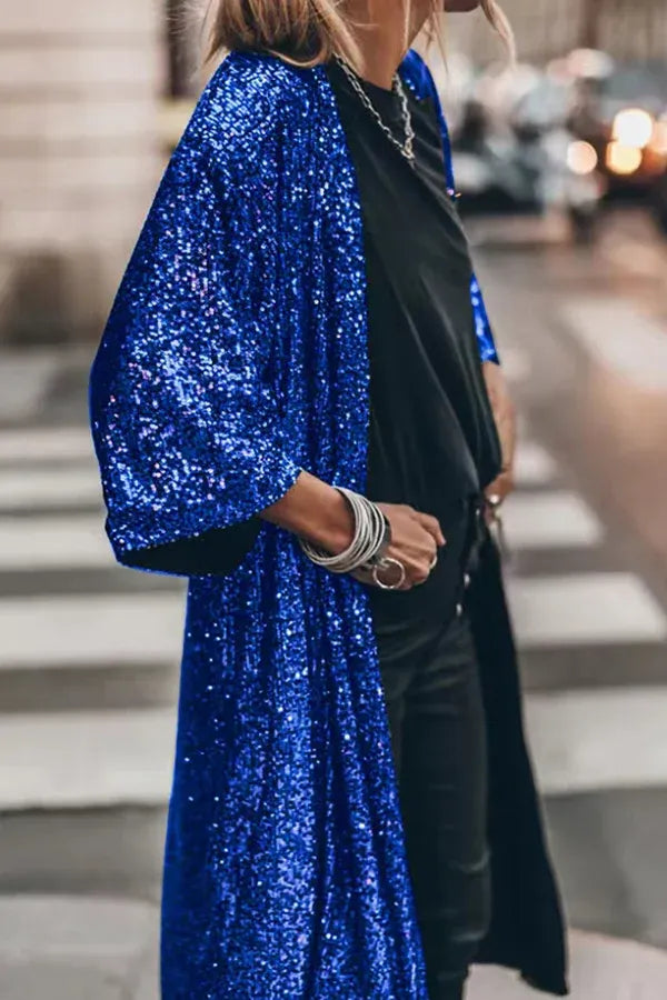 Eye-catching women's dazzling sequined kimono. Glamorous outerwear with a stylish keyhole for festive events.