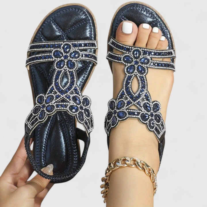 Close-up of stylish women's orthopedic sandals, highlighting elegant bead design and all-day comfort features.