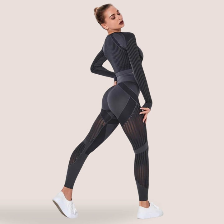 Close-up of seamless anti-cellulite texture on slimming high-waist leggings for women.