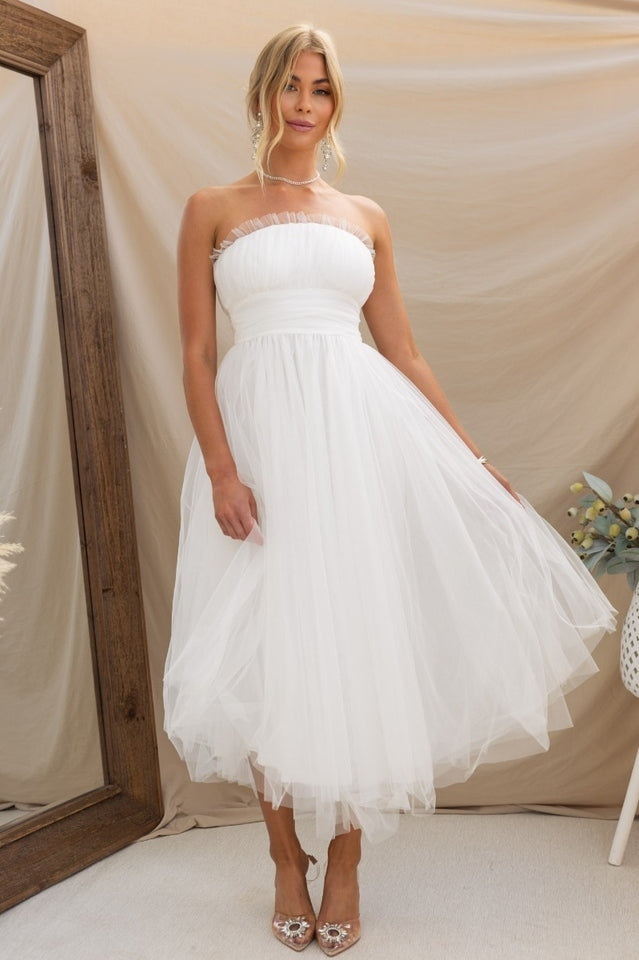 Graceful women's strapless maxi dress, a sophisticated long formal gown for evening or special events.