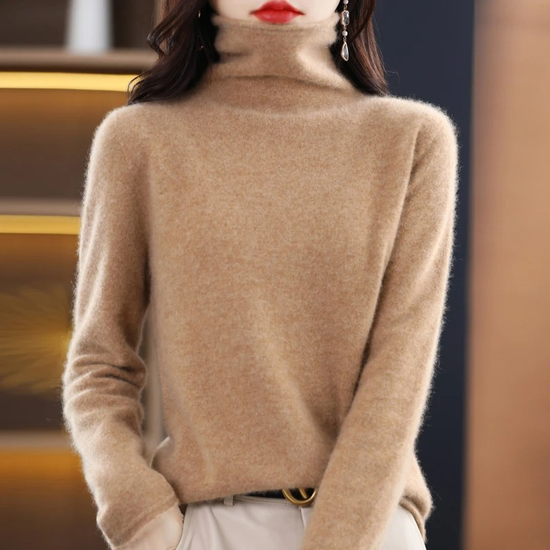 Stylish women's roll neck top. Soft, comfortable long sleeve sweater for versatile wear.