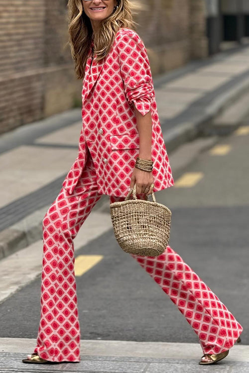 Chic women's flare pants with geometric print, part of a red suit set. Fashionable bottom for formal or casual outfits.