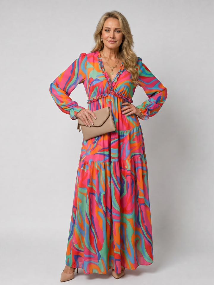 Vibrant floral print women's long sleeve tiered maxi dress, designed for a flattering and flowy look.