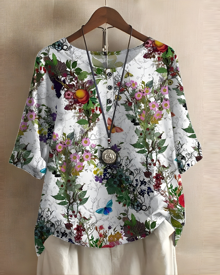 Casual women's boho top, featuring a striking print and comfortable, airy design.