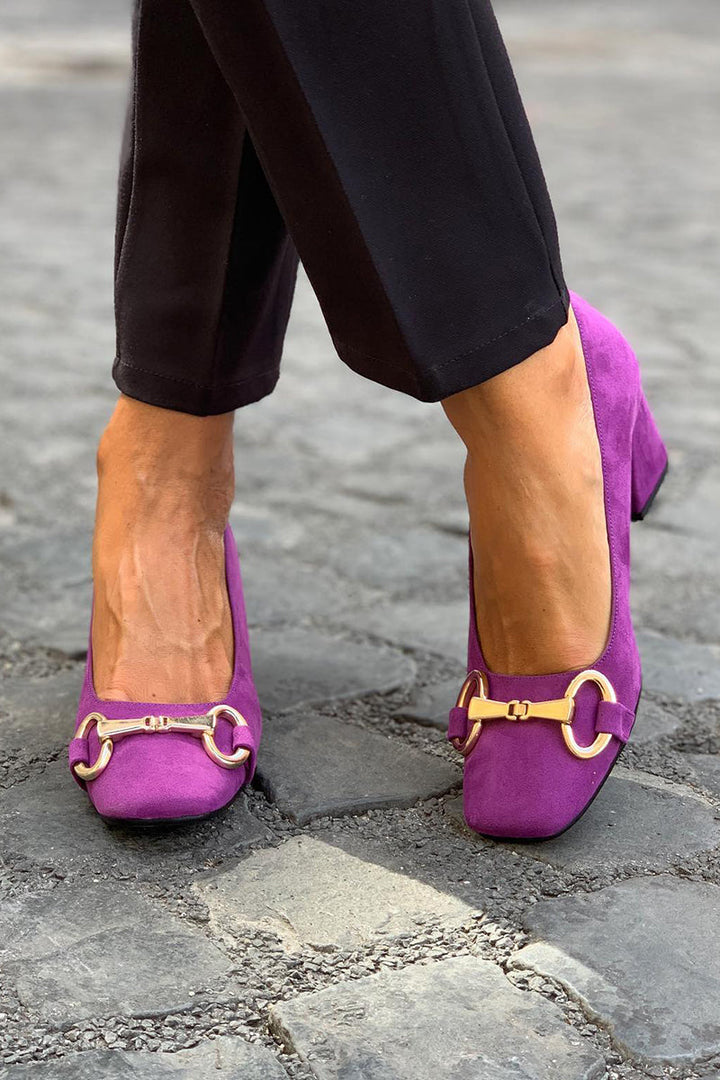 Chic women's colorful block heel sandals featuring a trendy square toe, ideal as vibrant party heels.