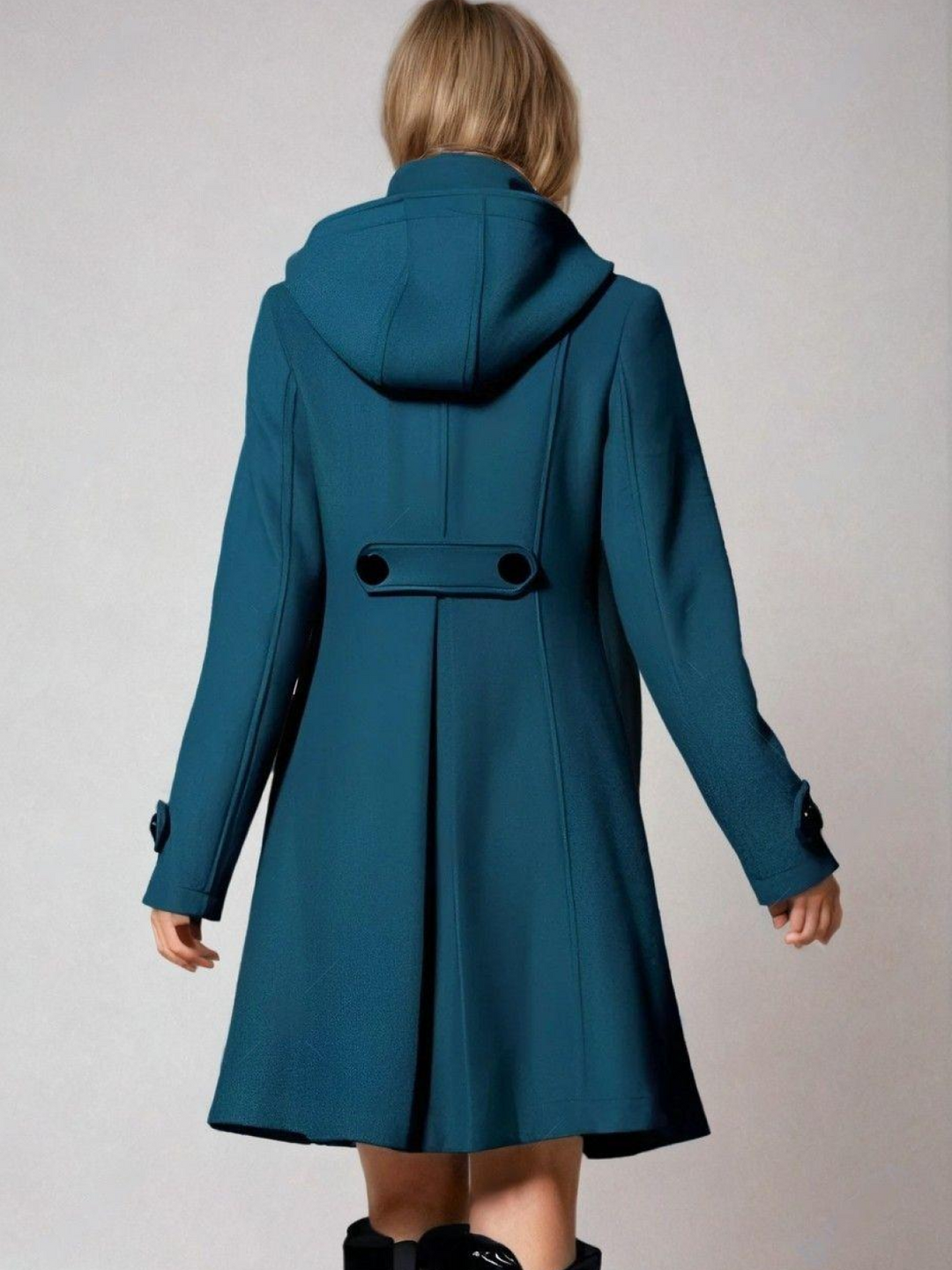 Fashionable women's A-line coat featuring an elegant funnel neck. Double-breasted design, ideal chic winter outerwear.