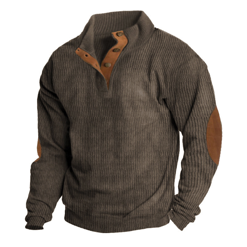 Modern men's pullover sweater with a half-button placket and distinctive elbow patches, a timeless fashion staple.