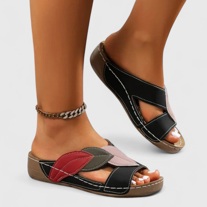 Comfortable women's walking sandals, engineered with arch support for foot pain relief.