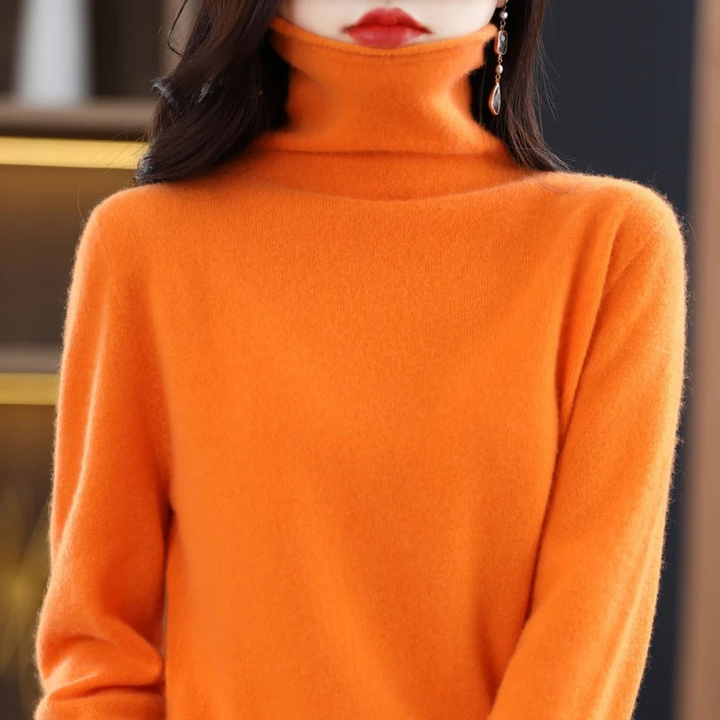 Women's warm roll neck sweater. Soft, comfortable long sleeve pullover for autumn style.