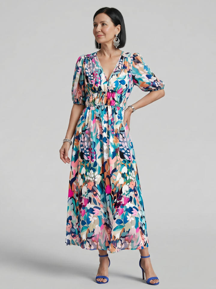 Elegant women's midi dress, abstract print, puff sleeves, V-neck. Ideal for sophisticated spring/summer casual wear.