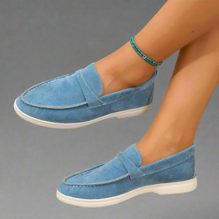 Ladies' classic moccasins, comfortable and elegant slip-on flats for casual everyday style.