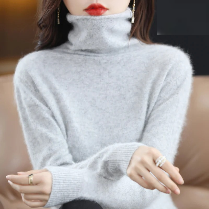 Warm women's turtleneck long sleeve sweater, perfect for casual elegance & winter comfort.