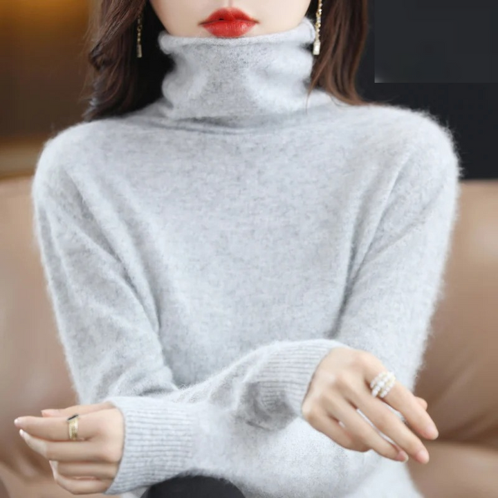 Warm women's turtleneck long sleeve sweater, perfect for casual elegance & winter comfort.