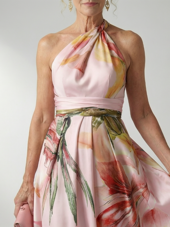 Flattering women's floral halter neck maxi dress. Comfortable, flowing, and lightweight for any summer day.