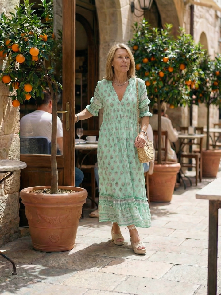 Women's comfortable V-neck floral midi dress, designed for easy everyday style. A must-have for summer fashion.