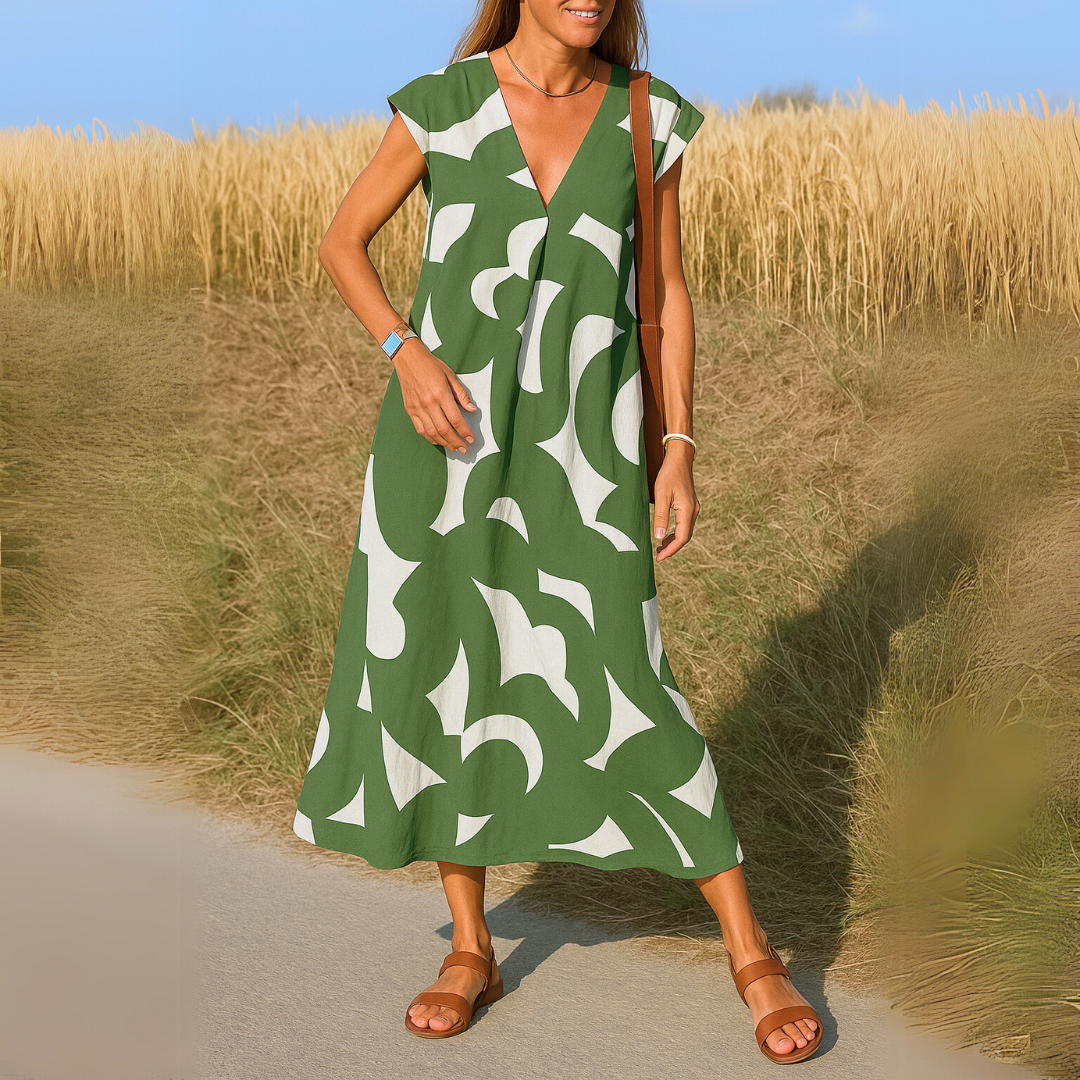 Comfortable flowy women's lightweight V-neck dress. Breathable fabric, ideal for warm weather, casual & elegant.