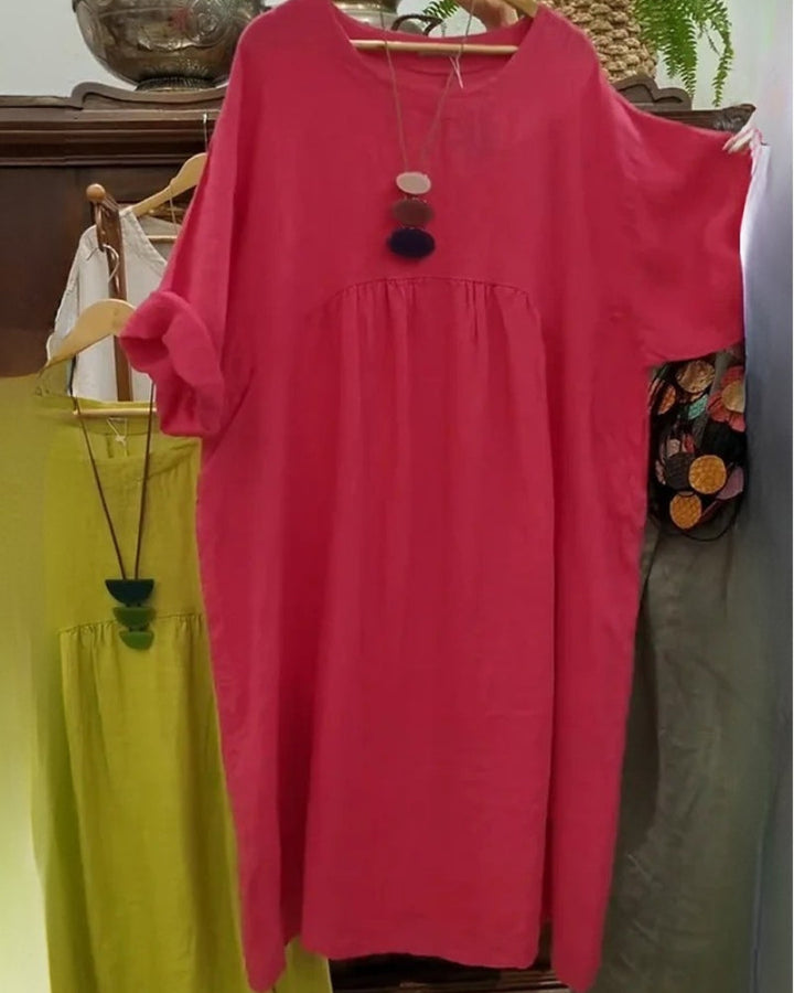 Comfortable women's everyday dress in a relaxed wide fit, providing flattering belly coverage and knee-length style.