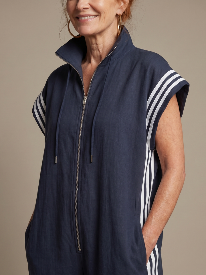Plus size women's casual jumpsuit, zip front with stripe panels, offering effortless style.