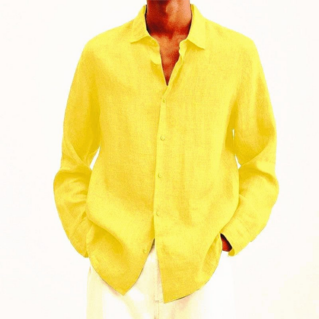 Casual men's long-sleeve button-up shirt, worn untucked for a relaxed and comfortable everyday style.