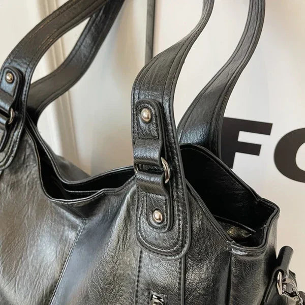 Elegant women's vegan leather tote, a spacious shoulder handbag ideal for everyday and work use.