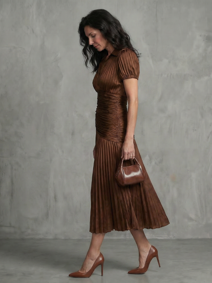 Summer-ready women's stripe midi dress, featuring a comfortable pleated waist.