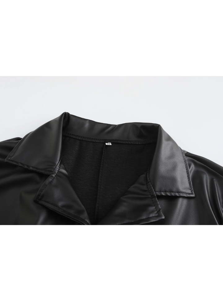 Sleeve cuff detail on men's classic long coat, showcasing elegant and formal styling.