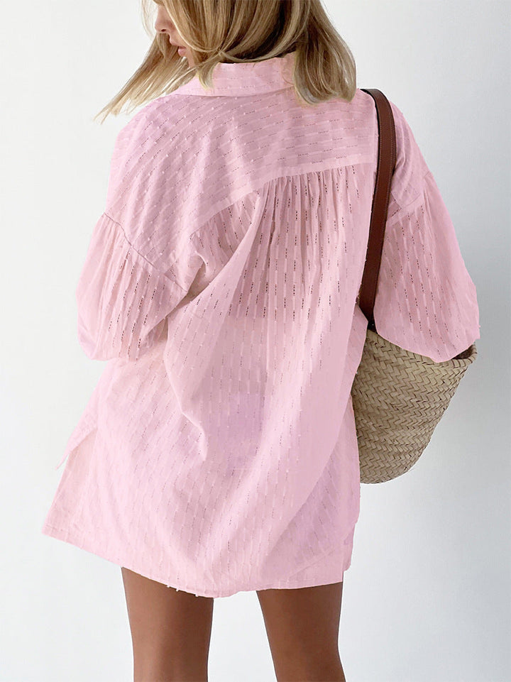 Detailed shot of the lightweight fabric and eyelet embroidery on the women's summer short set.