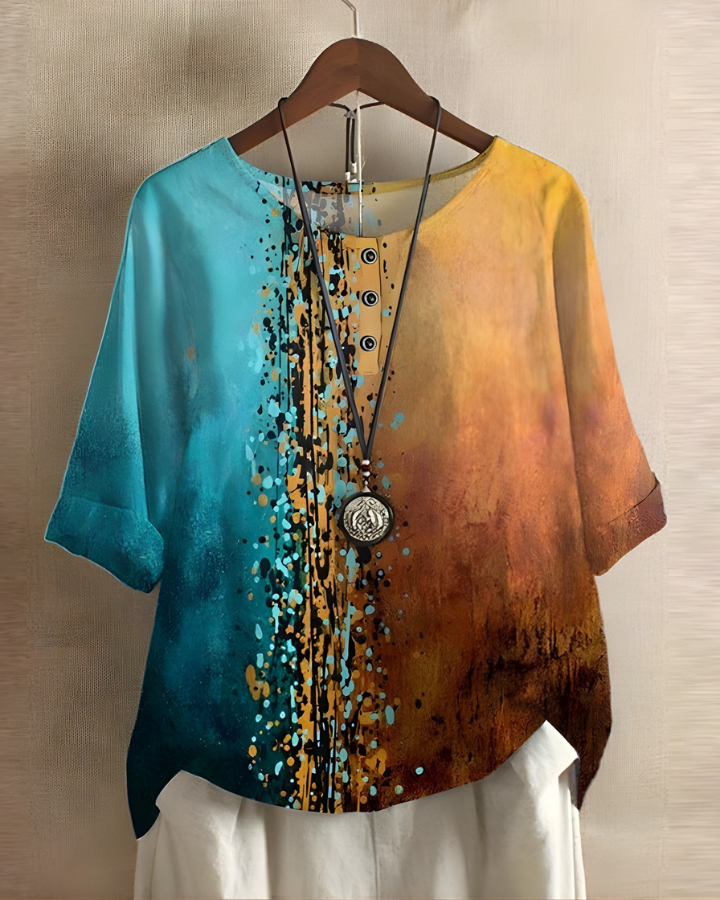 Stylish women's summer top, relaxed fit, vibrant print, perfect for a boho casual look.