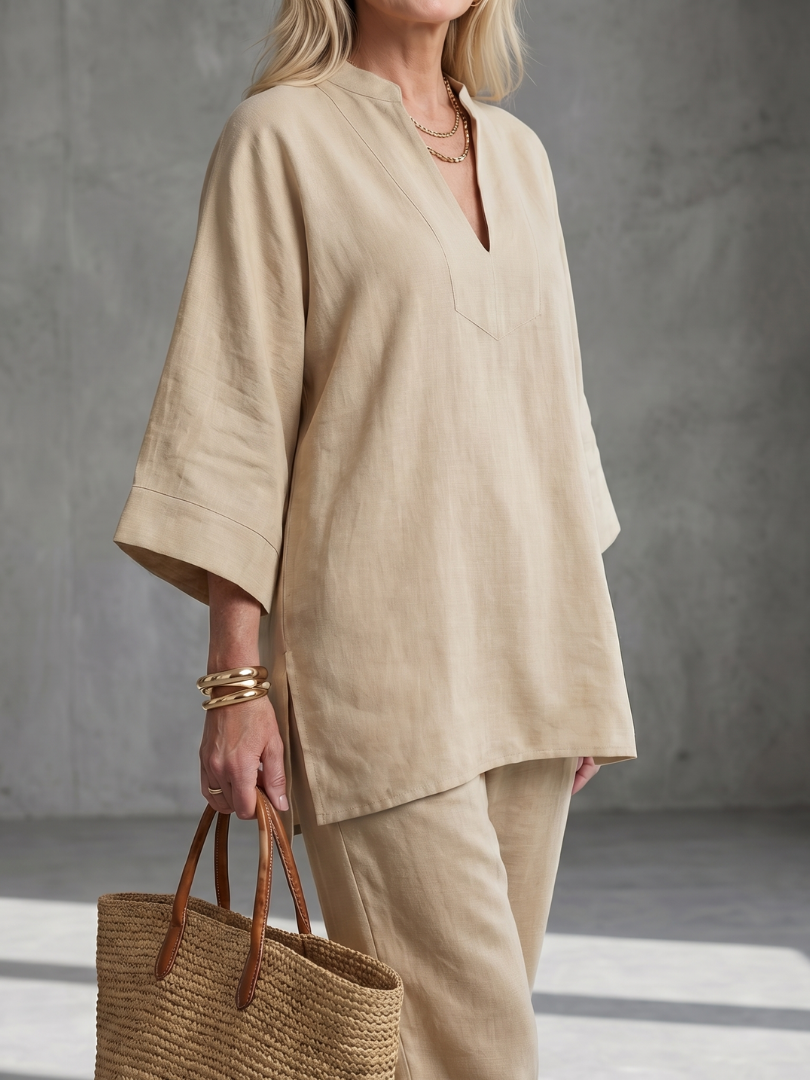 Women's stylish two-piece set: relaxed V-neck tunic, wide sleeves, and comfy trousers.