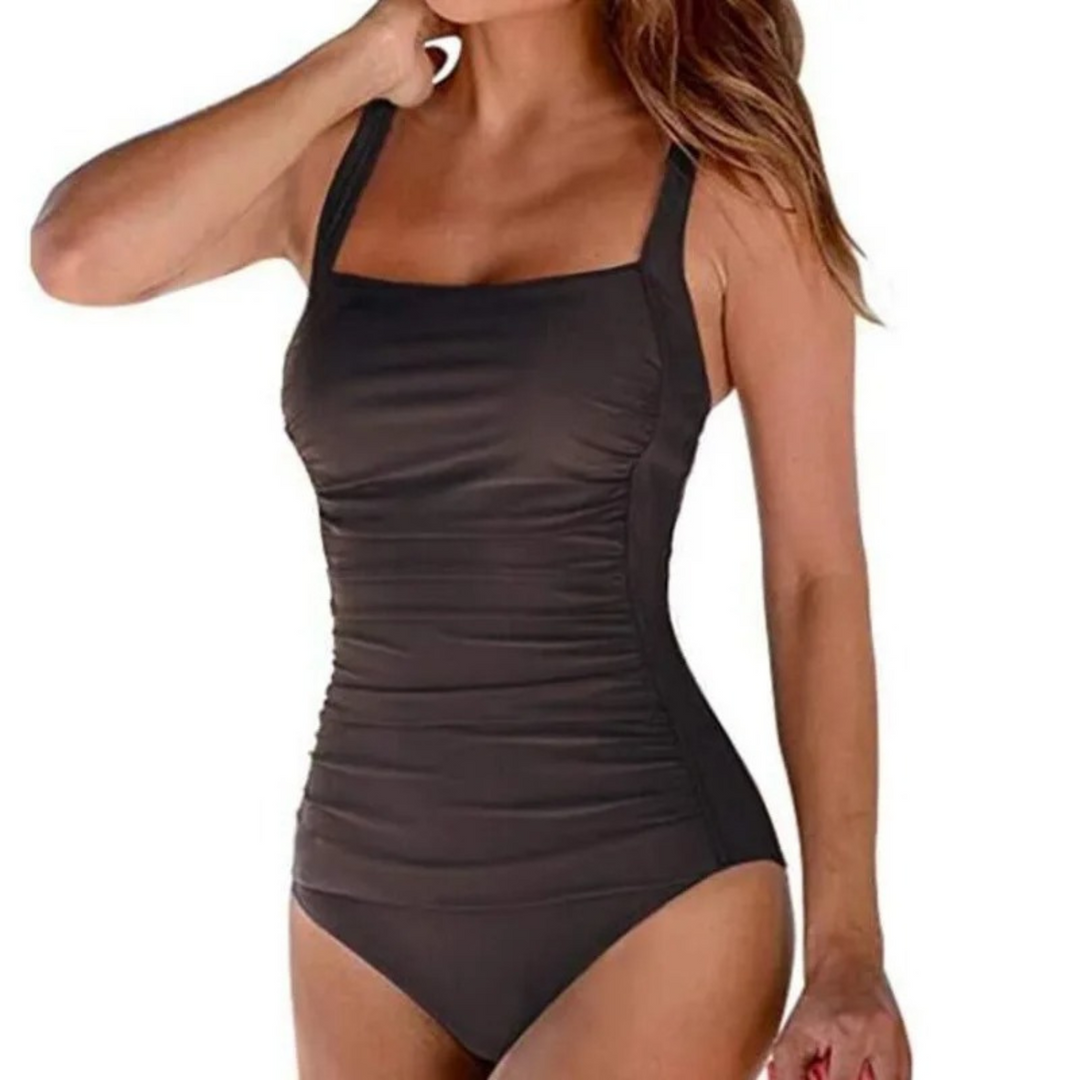 Elegant women's one-piece monokini swimsuit, a stylish choice for summer beachwear, vacation, and poolside fashion.