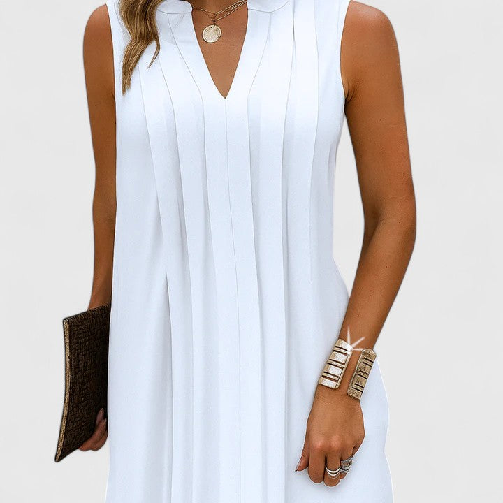 Flowing V-neck summer dress, elegant and flattering for warm weather.