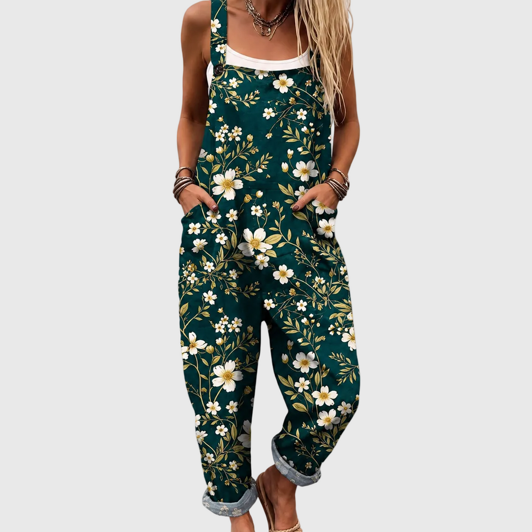 Women's emerald floral jumpsuit with adjustable straps & pockets. Ideal for elegant summer casual wear or vacation.