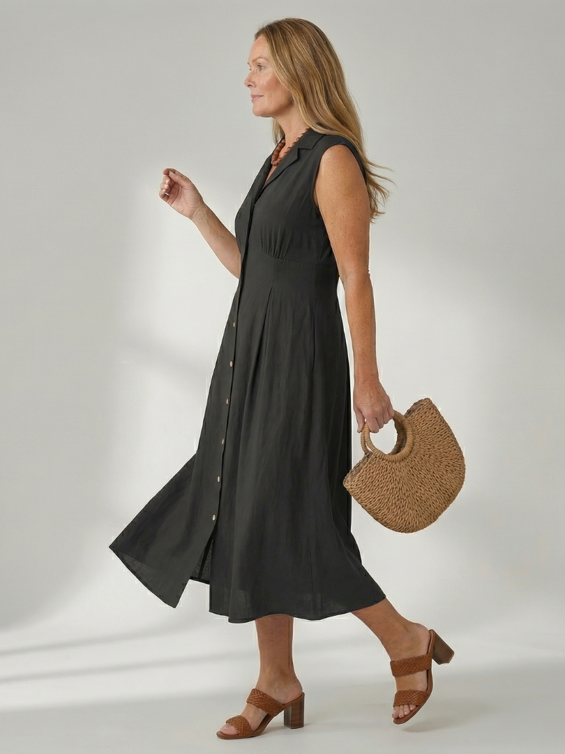 Chic women's sleeveless midi dress with full button front, versatile for day to evening.