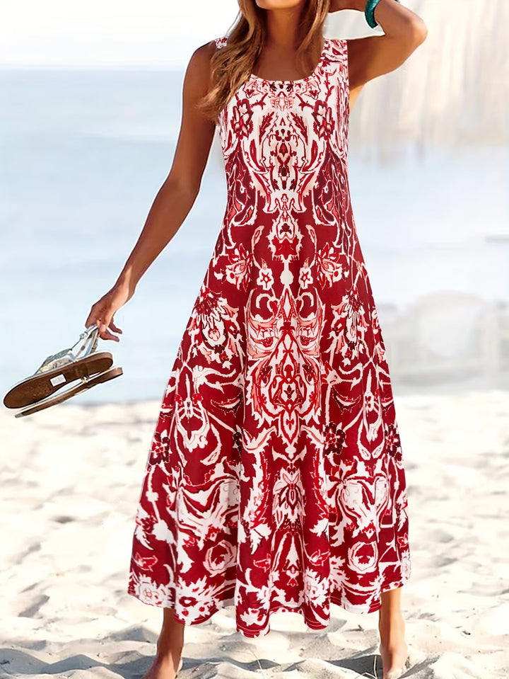 Elegant women's sleeveless floral summer midi dress. Perfect flowy vacation attire for warm weather.