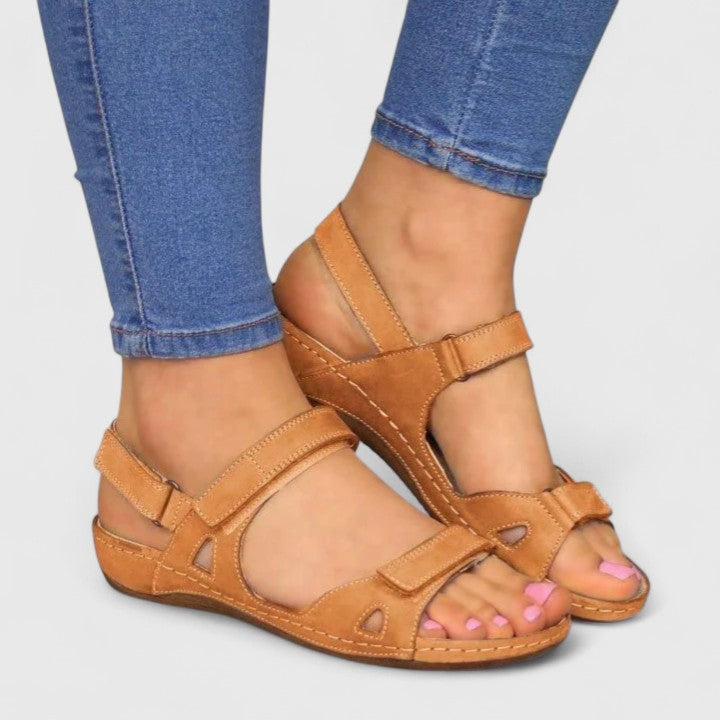 Casual women's sandals featuring cushioned sole & arch support for ultimate comfort & pain relief.
