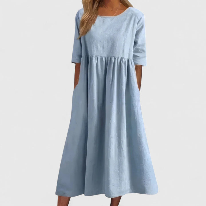 Versatile women's everyday midi dress: elegant, lightweight, and comfortable with a round neck for summer.