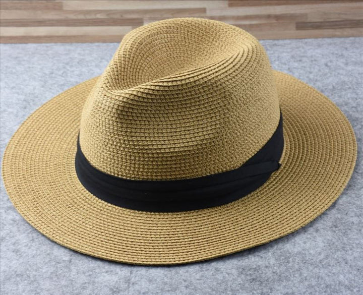 Stylish women's straw wide brim hat. This Panama style beach hat is a chic, adjustable summer sun protection accessory.