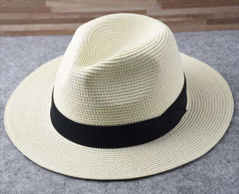 Adjustable wide brim straw sun hat for women. Chic Panama style beach accessory, offers great summer sun protection.
